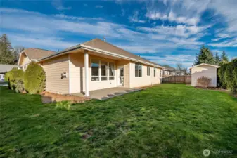 Low maintenance private backyard with covered patio