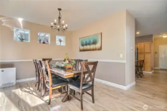 Dining room has picture windows
