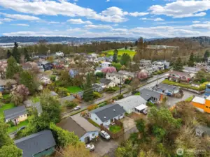 Also known to some as Pigeon Hill, this small pocket neighborhood is one of West Seattle’s best-kept secrets. A mix of eclectic architecture, beloved gardens, winding streets, and genuinely friendly neighbors gives the area a character that feels both vibrant and grounded. It offers that increasingly rare balance of peaceful residential living and exceptional convenience—close enough to downtown Seattle, Alki Beach, and the Alaska Junction to make daily life easy, yet tucked away enough to feel like a world of its own.