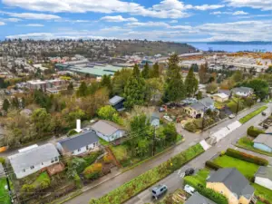 Also known to some as Pigeon Hill, this small pocket neighborhood is one of West Seattle’s best-kept secrets. A mix of eclectic architecture, beloved gardens, winding streets, and genuinely friendly neighbors gives the area a character that feels both vibrant and grounded. It offers that increasingly rare balance of peaceful residential living and exceptional convenience—close enough to downtown Seattle, Alki Beach, and the Alaska Junction to make daily life easy, yet tucked away enough to feel like a world of its own.