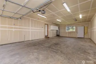 Garage is LARGE, deep enough for 4 cars!