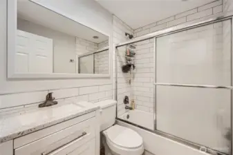 Remodeled hall bath!  Love the subway tile.