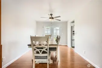 French doors lead to the backyard and new deck!