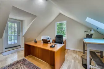 Primary Level 2 den/office with view and access to deck. Note - there are 2 roof decks on Level 2 on each side of the home.