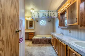 Primary bathroom with dual sinks.