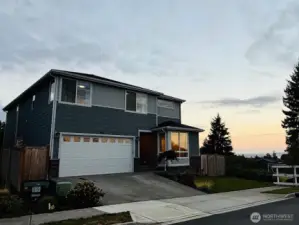 Front exterior of Lake Stevens home with landscaped yard and attached garage.