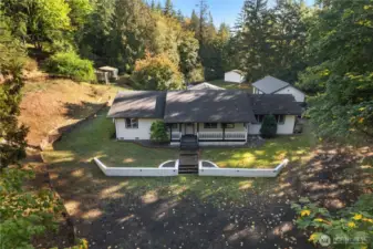 A nice private country property, with a garage/workshop, 2nd workshop, and a greenhouse!