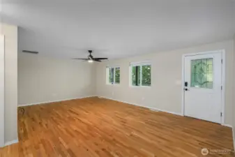 You enter into the LR after crossing the covered porch.
