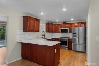 You'll enjoy an updated stone and stainless kitchen!