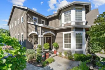 A covered front patio and grand entry welcome you to main floor with formal living and dining rooms, kitchen, breakfast nook, family room, office and ½ bathroom.