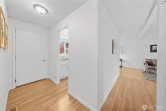 Front door gives you a choice to the kitchen