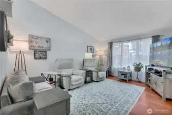Large window in front living room provides beautiful, warm natural light.