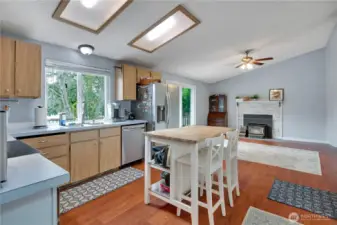From dining room, take a right into your kitchen, and take a look at the open concept that flows right into the family room.