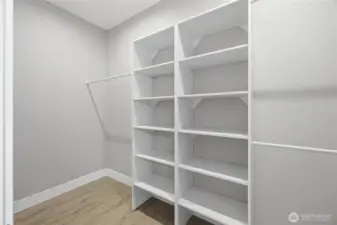 Primary walk in closet.