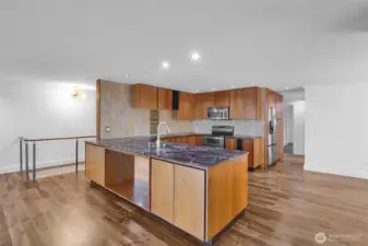 Modern kitchen with sleek finishes and stainless steel appliances