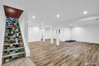 Lower-level living space ideal for media room, guests, or recreation