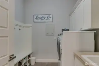 Main floor utility with storage