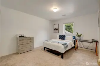 Generously sized secondary bedrooms offer flexibility for guests, hobbies, or multi-generational living.