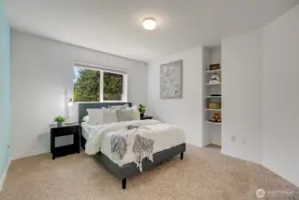Natural light creates warm, inviting environments throughout this bedroom.