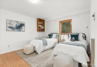 3rd bedroom on lower level with tall ceilings