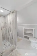 Tiled shower in 3/4 bath upstairs