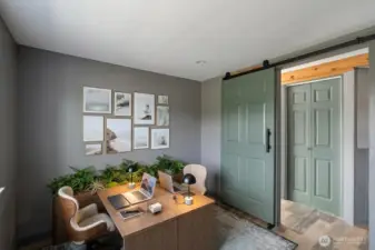 Virtually staged office space in lower level