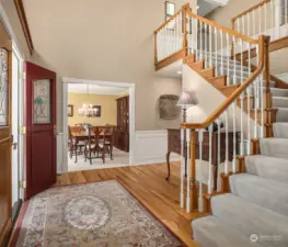 The 2-story entry and the classic staircase welcome you inside!