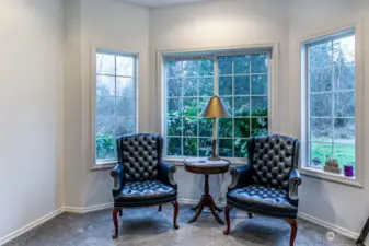 Living room/sitting area with bay window