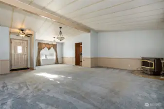 Living room facing Dining room and entrance to kitchen