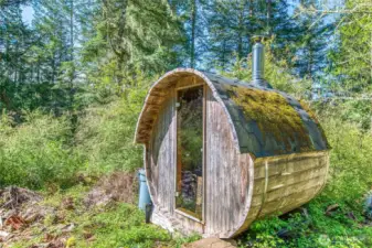 Barrel-style cedar sauna, designed for wet or dry use. Currently repurposed as a garden shed.