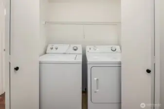 The full sized washer & dryer are sited in the hallway. Appliances will stay.