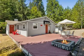 Close to the 3rd fairway, perfectly sized 1200 sf 2 BR/1.5 BA with garage and private outdoor spaces.