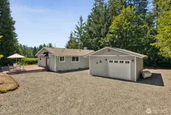 Plenty of driveway parking + an oversized 1 car garage with space for a workshop or golf cart.
