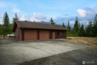 Oversized 2 car garage with heated bonus room and shop