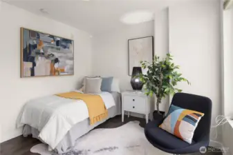 Downstairs bedroom, studio, or office.