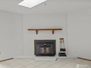 Wood stove and you wont need to purchase wood, you will live in the woods