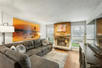 Living room w/ wood burning fireplace