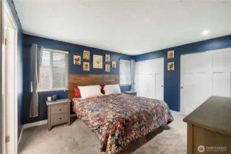 Bedroom #1 w/ double closets off primary bathroom