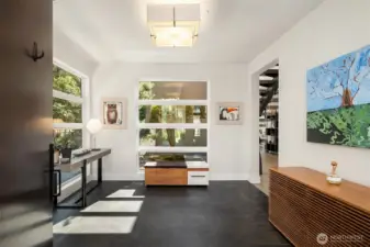 Light-filled entry with a gallery-like feel—framing views of the landscape and introducing the home’s architectural language.