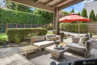 Designed for everyday living and effortless entertaining—covered outdoor spaces with built-in grilling, dining, and lounge areas, all anchored by a private, landscaped yard with turf