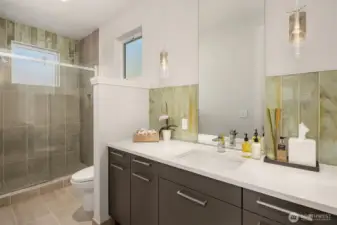Spa-inspired bath with clean lines, refined finishes, and a walk-in glass shower—designed for both form and function.