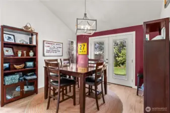 Adjacent to the LR is Dining Room with French Door to the backyard.  Kitchen to the right.
