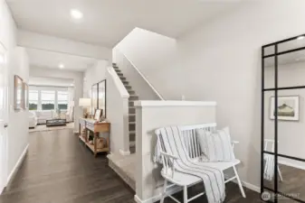 Open entry with extended laminate flooring. Photos are for representational purposes only.  Colors and finishes may vary.