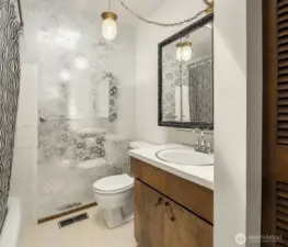 Main level full bathroom.