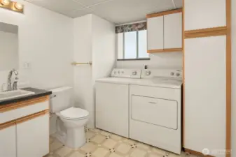 Downstairs 1/2 bathroom and laundry room.