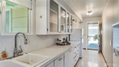 Lots Of Counter Space To Prep Food. Utility Area And Bones Room To The Left Of Door