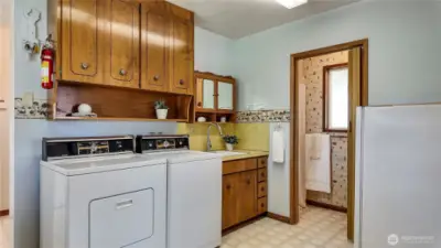 Utility Area W/ Stand Up Deep freeze And Half Bath