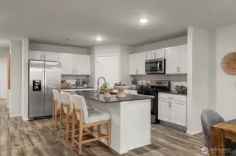 Disclaimer- Photos are from a similar floor plan from another community, photos are for illustrative purposes only. Finishes, flooring, upgrades, countertops, paint, and other features may vary.
