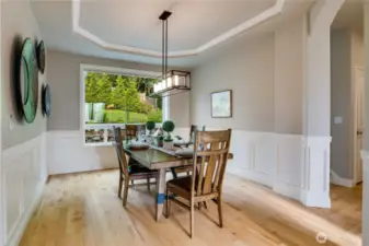Large window faces the rear yard in the dining room.  This room will allow for the table extensions for gatherings that turn into memories.