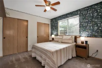 primary suite with dual closets